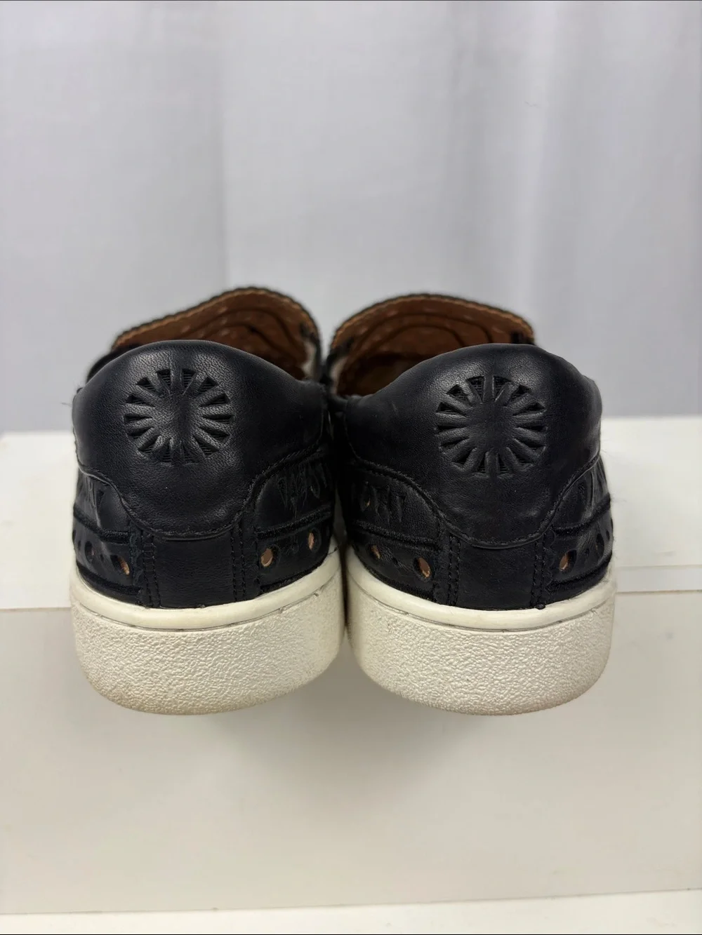 UGG CAS‎ Perforated Slip On Sneaker in Black.